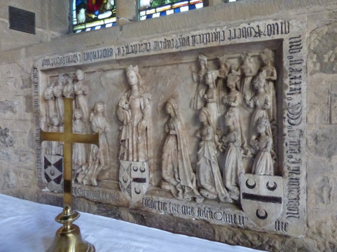 Reredos, depicting the Virgin and Child and the large family of Robert and Joan Gylbert.