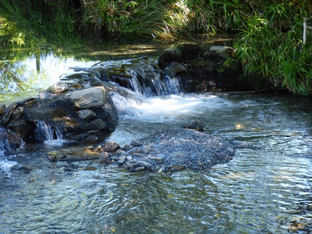 Image of clear stream and waterfall